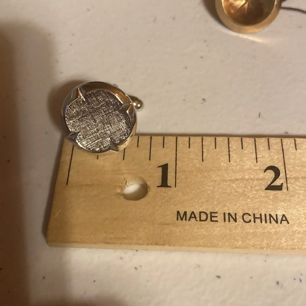 Set of 2 vintage cuff links.  Gold tone/ silver tone. Silver pair are Anson